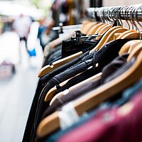 Kleiderbörse/Ярмарок одежі/Clothing Bazaar